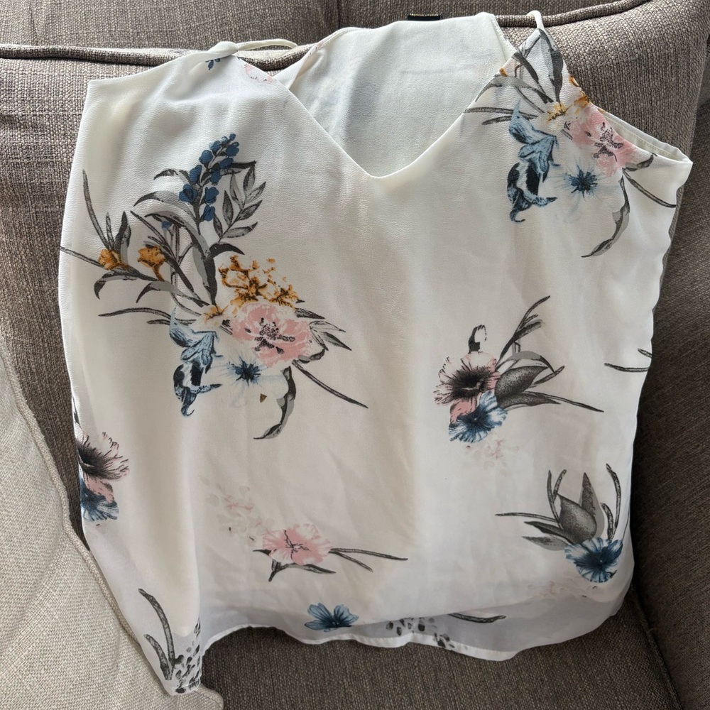 Floral White Sleeveless Blouse